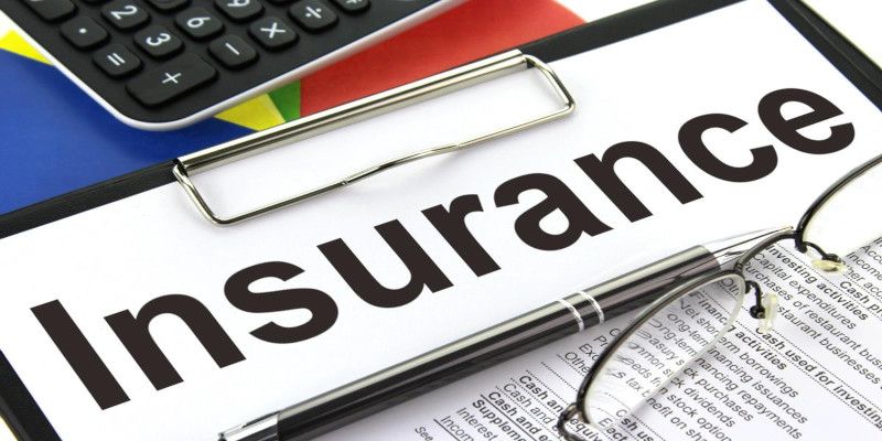 Image of the word 'insurance' written in black letters on a blackboard.