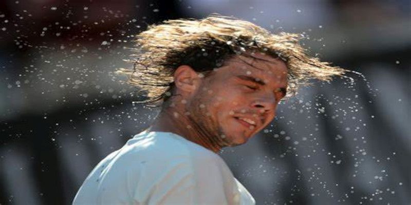 Image of the famous tennis player Rafael Nadal sweating.
